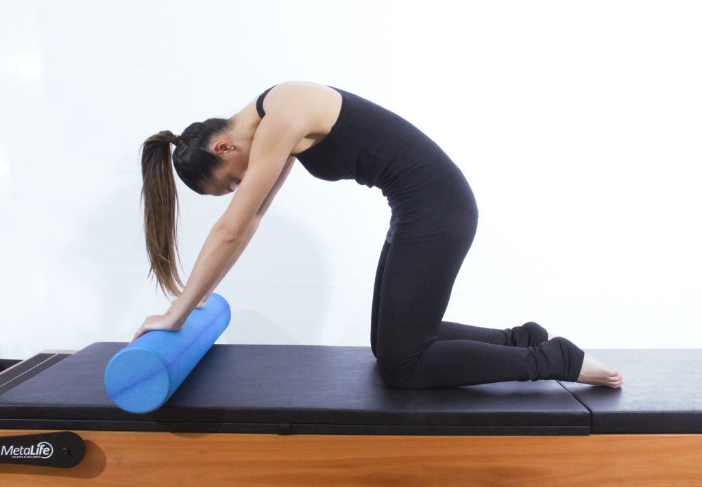 Exercício de pilates roller para desordens temporomandibulares