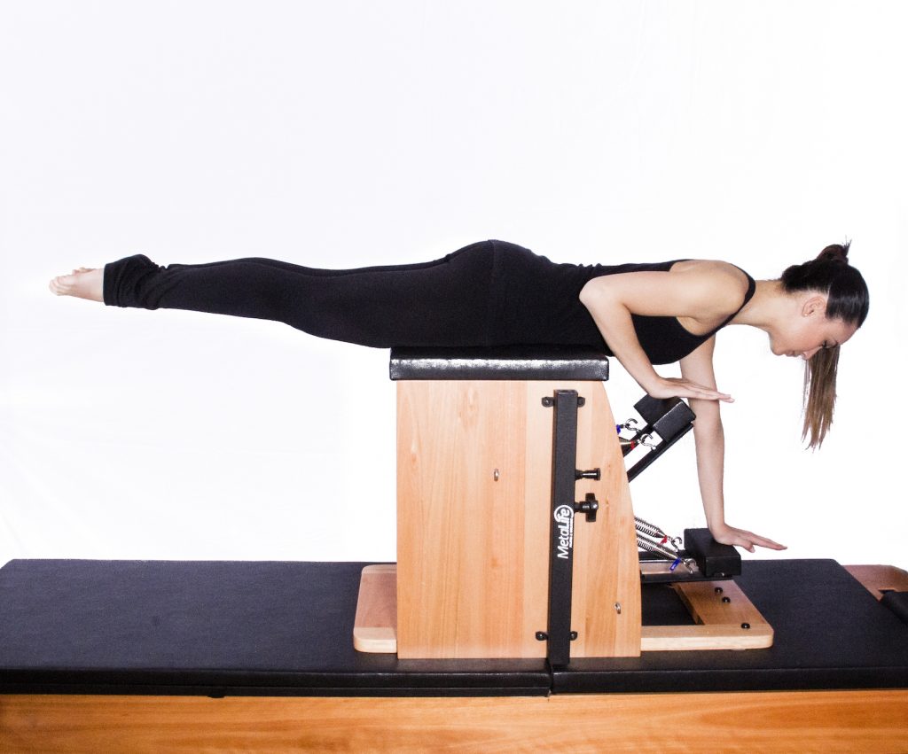 Exercício de pilates chair